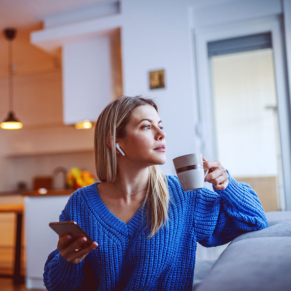 ECH Corporate Housing Solutions female drinking coffee